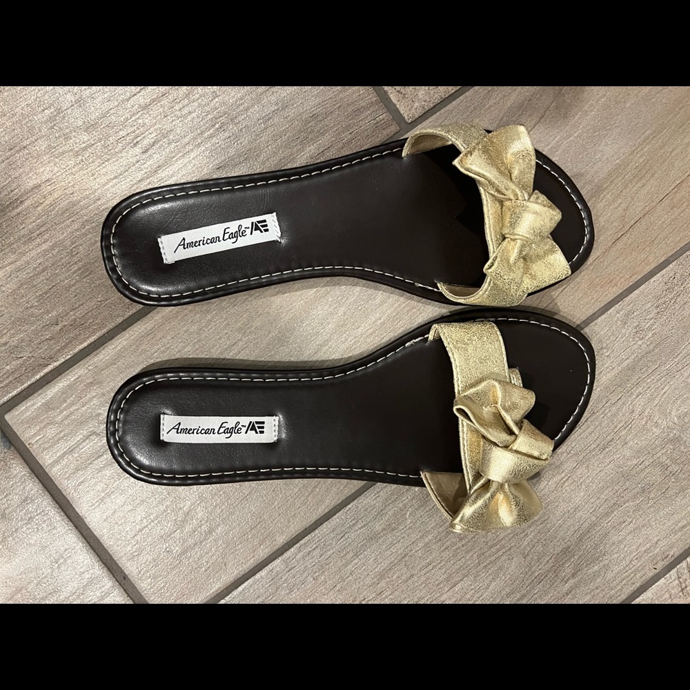 Brand new in box cute flats with gold bows